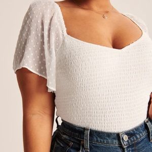 BLACK smocked flutter sleeve top